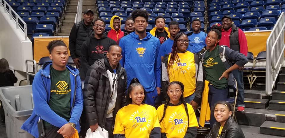 boys and girls clubs of rochester members at a basketball game